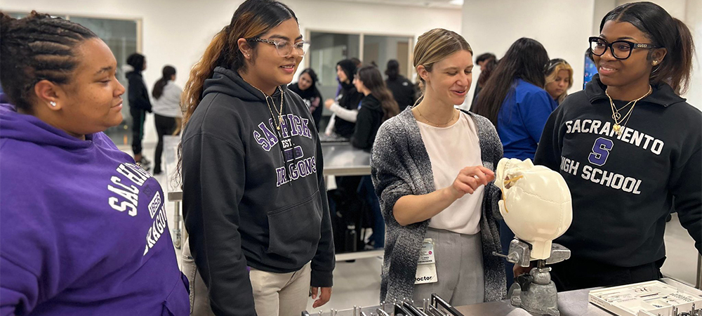 Resident teaching high school students